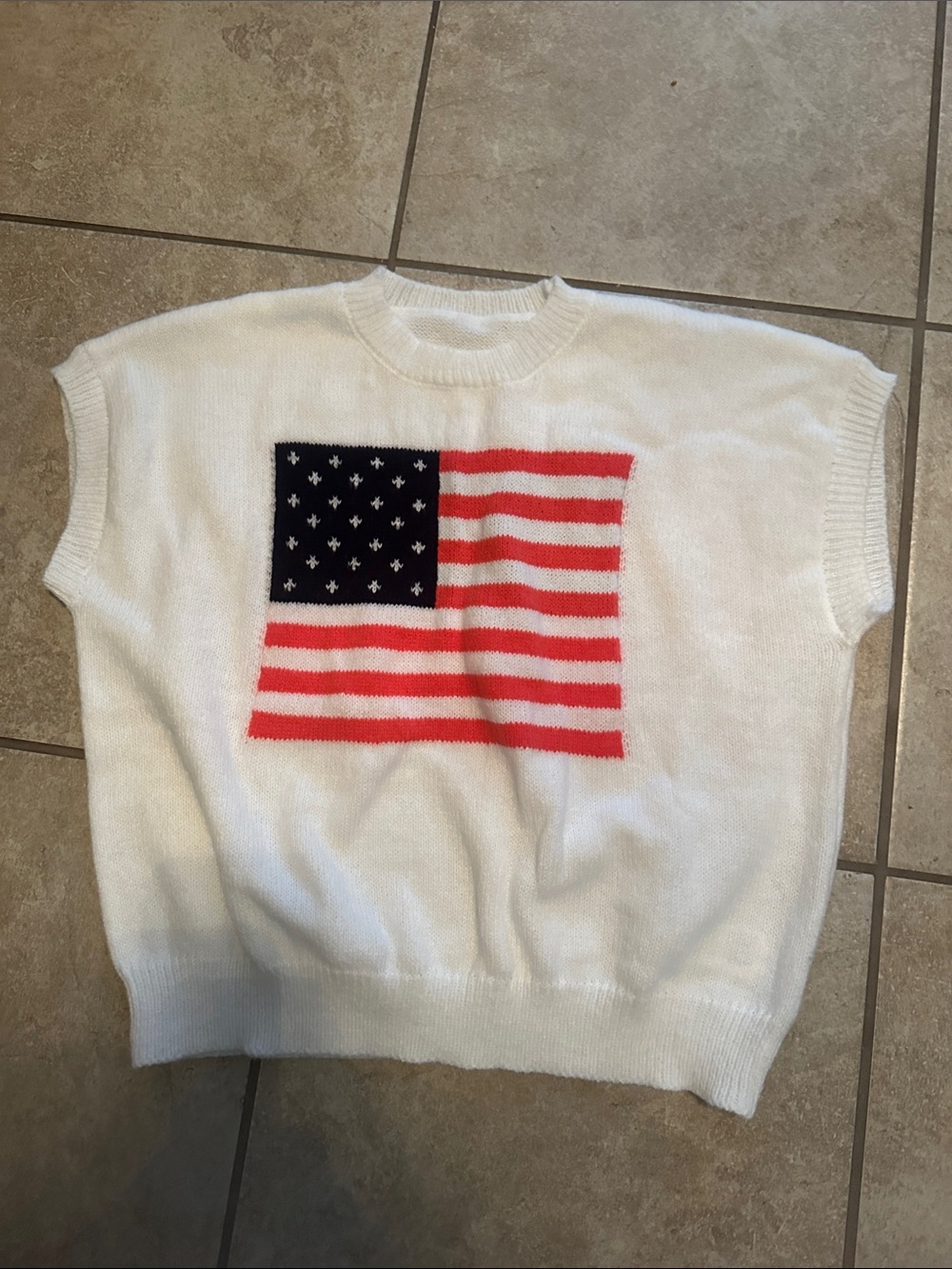 Short sleeve American sweater. Lightweight sweater material. New without tags.
